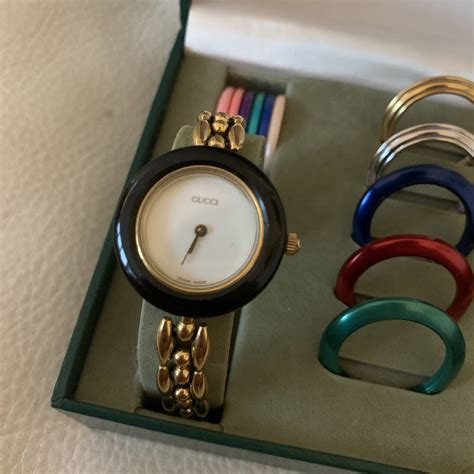 gucci womens watch with changeable bezels